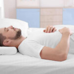 man sleeping on the back in the image